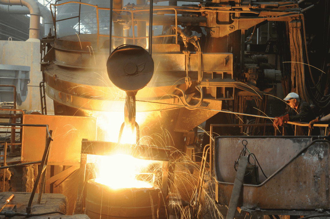 sparks flying out of molten metal ladle